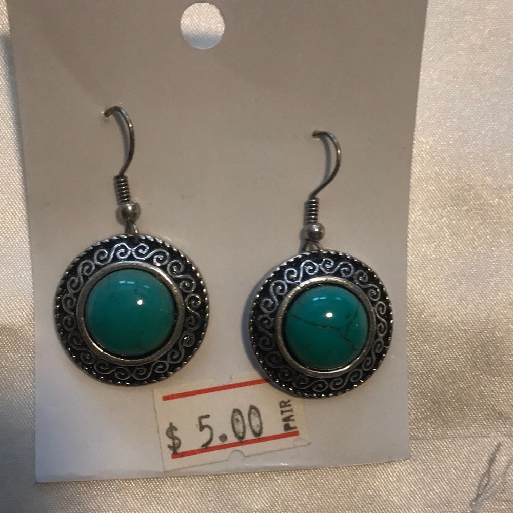 Never worn , sliver plated earrings
